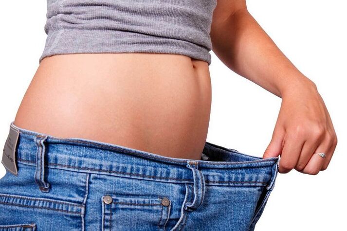 pengurangan pinggang karena penurunan berat badan